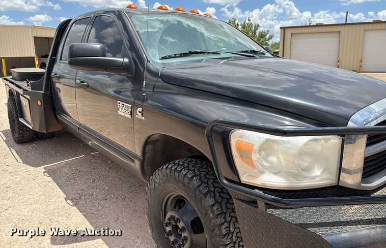 image for item ED5752 2007 Dodge Ram 3500 Quad Cab flatbed pickup truck