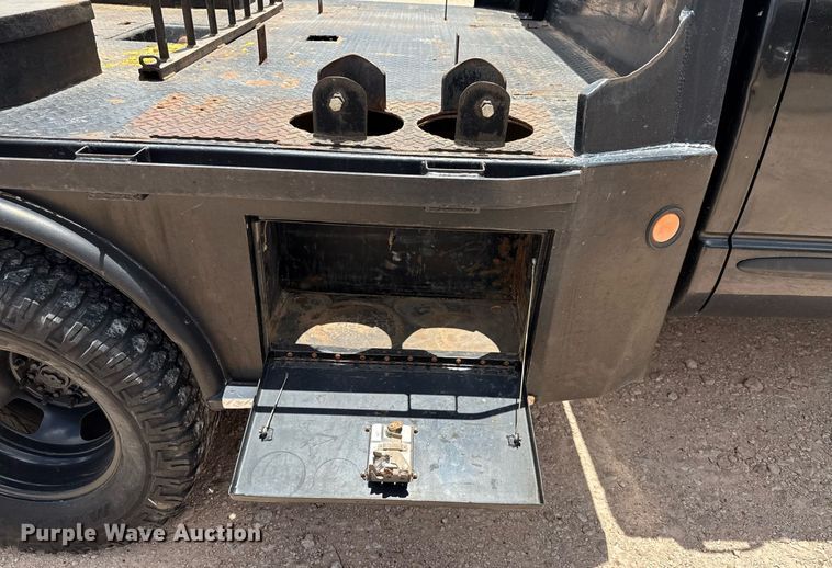 image for item ED5752 2007 Dodge Ram 3500 Quad Cab flatbed pickup truck