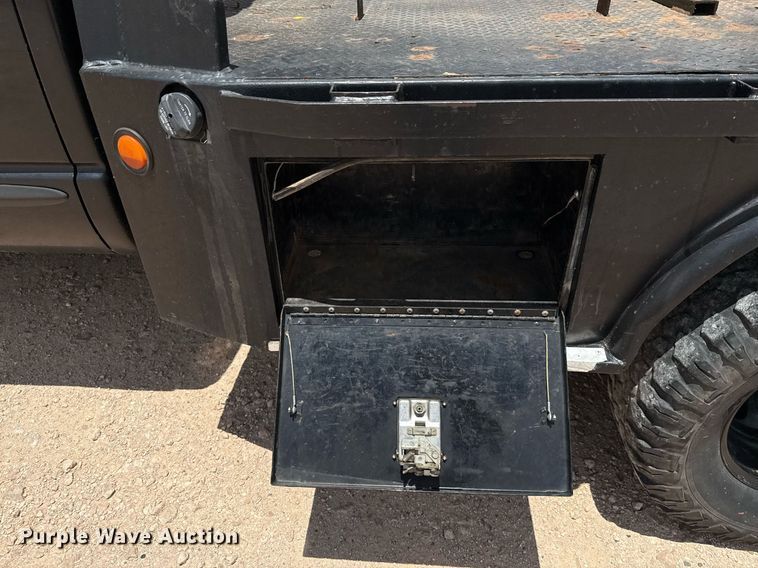 image for item ED5752 2007 Dodge Ram 3500 Quad Cab flatbed pickup truck