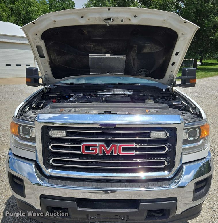 image for item EF1591 2018 GMC Sierra 3500HD Crew Cab utility bed pickup truck