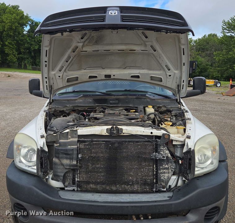 image for item EF1680 2010 Dodge Ram 5500 Crew Cab dump flatbed truck