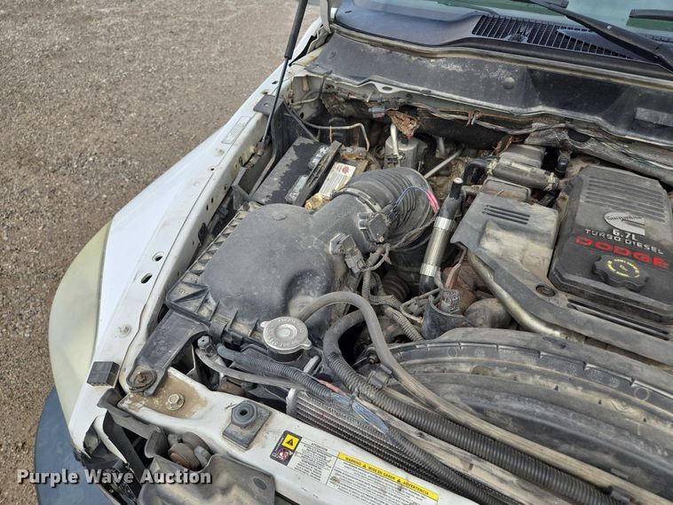 image for item EF1680 2010 Dodge Ram 5500 Crew Cab dump flatbed truck