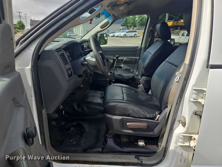 image for item EF1681 2010 Dodge Ram 5500 Crew Cab dump flatbed truck