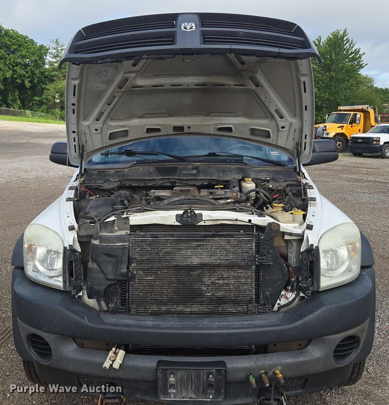 image for item EF1681 2010 Dodge Ram 5500 Crew Cab dump flatbed truck