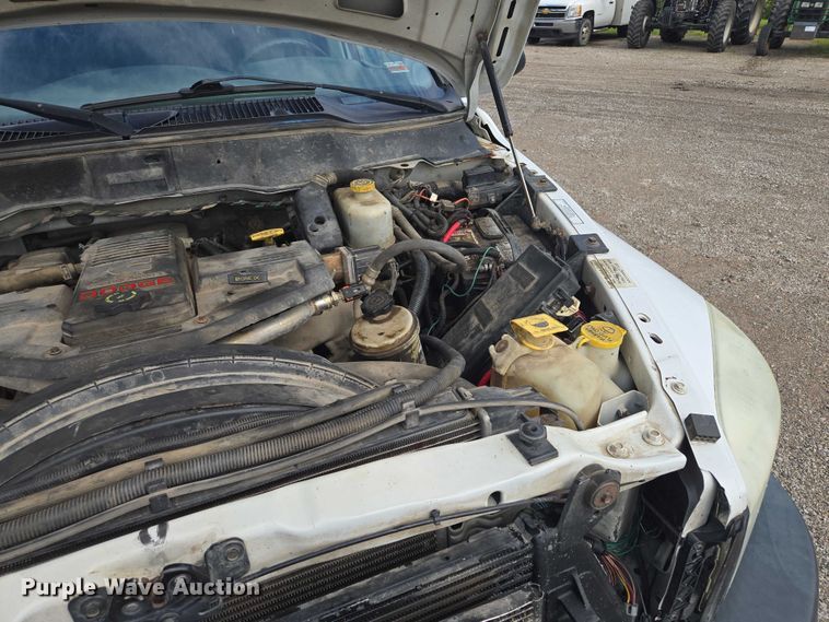 image for item EF1681 2010 Dodge Ram 5500 Crew Cab dump flatbed truck