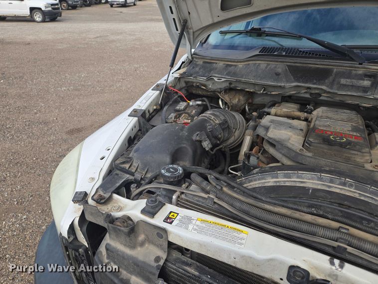 image for item EF1681 2010 Dodge Ram 5500 Crew Cab dump flatbed truck