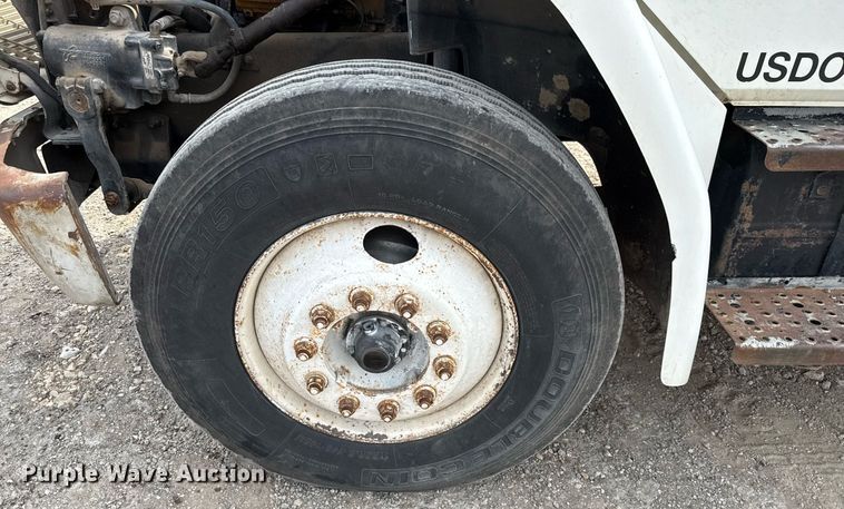 image for item EJ3744 2003 Freightliner FL80 flatbed truck