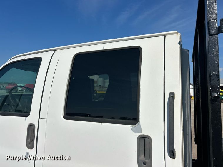 image for item EK8294 2006 GMC C5500 Crew Cab dump flatbed truck