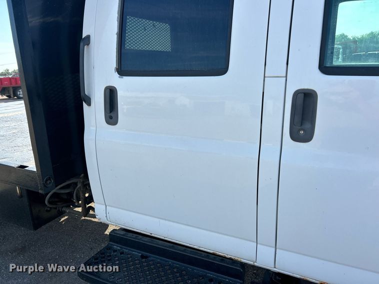 image for item EK8294 2006 GMC C5500 Crew Cab dump flatbed truck