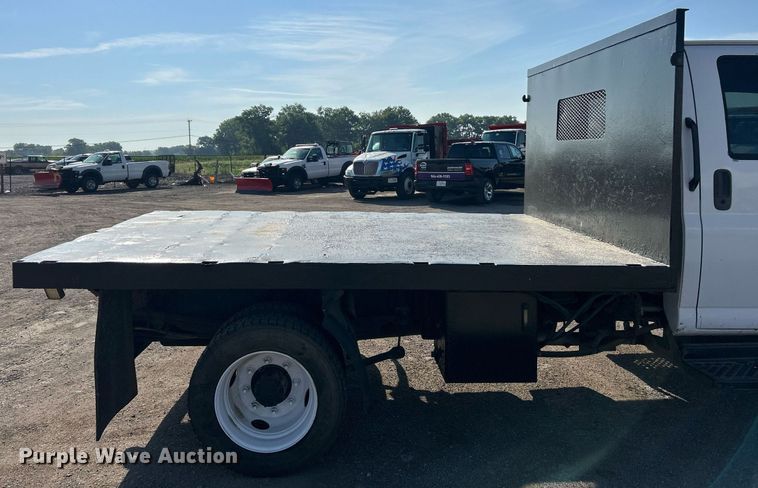 image for item EK8294 2006 GMC C5500 Crew Cab dump flatbed truck