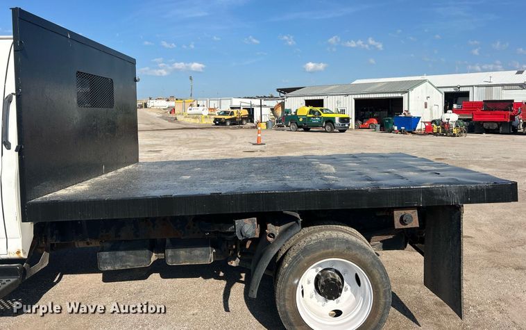 image for item EK8294 2006 GMC C5500 Crew Cab dump flatbed truck