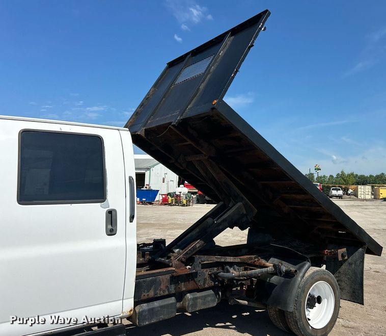 image for item EK8294 2006 GMC C5500 Crew Cab dump flatbed truck