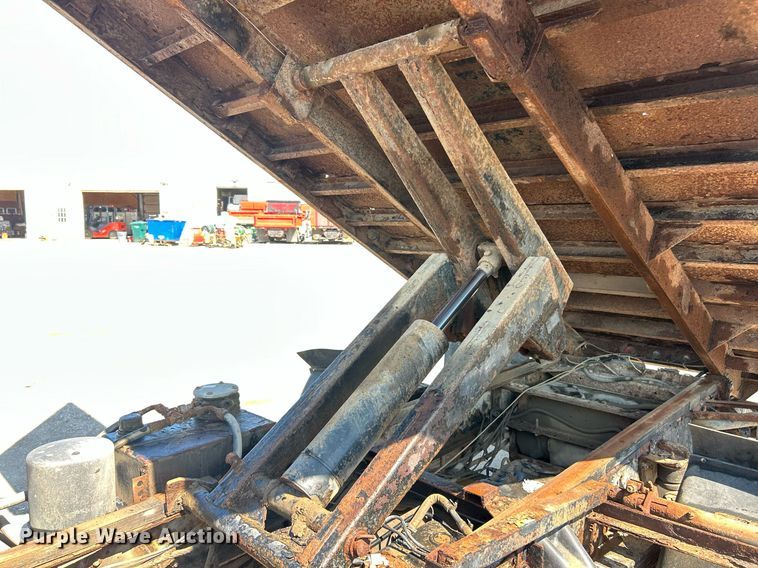 image for item EK8294 2006 GMC C5500 Crew Cab dump flatbed truck