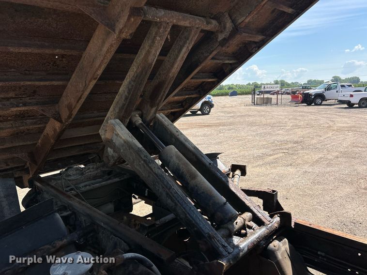 image for item EK8294 2006 GMC C5500 Crew Cab dump flatbed truck