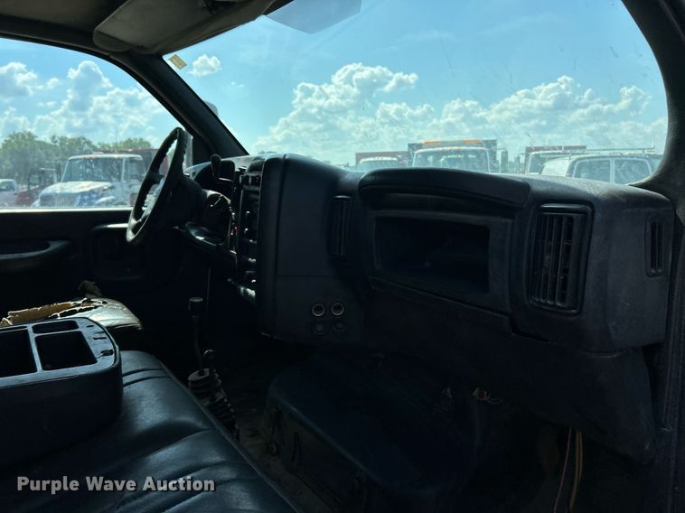 image for item EK8294 2006 GMC C5500 Crew Cab dump flatbed truck