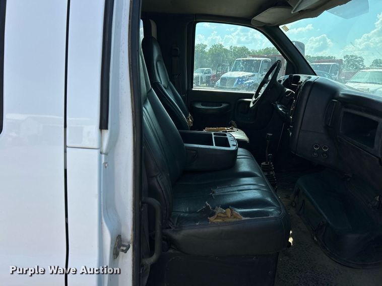 image for item EK8294 2006 GMC C5500 Crew Cab dump flatbed truck