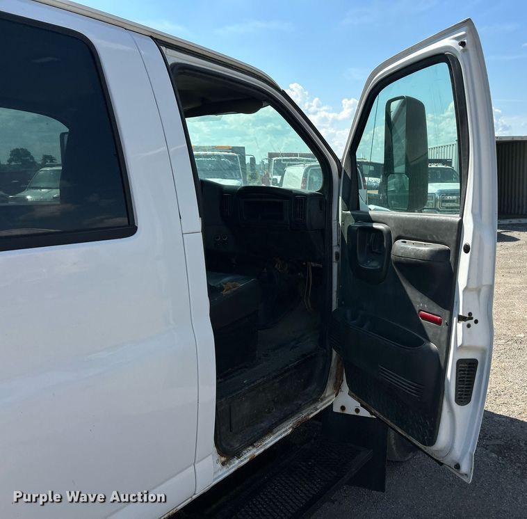 image for item EK8294 2006 GMC C5500 Crew Cab dump flatbed truck