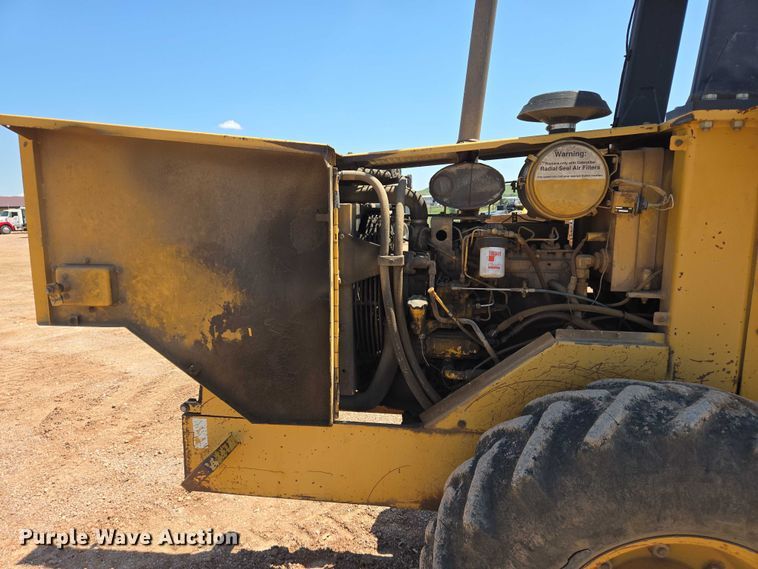 image for item DT7230 1997 Caterpillar CP-433C single drum vibratory roller