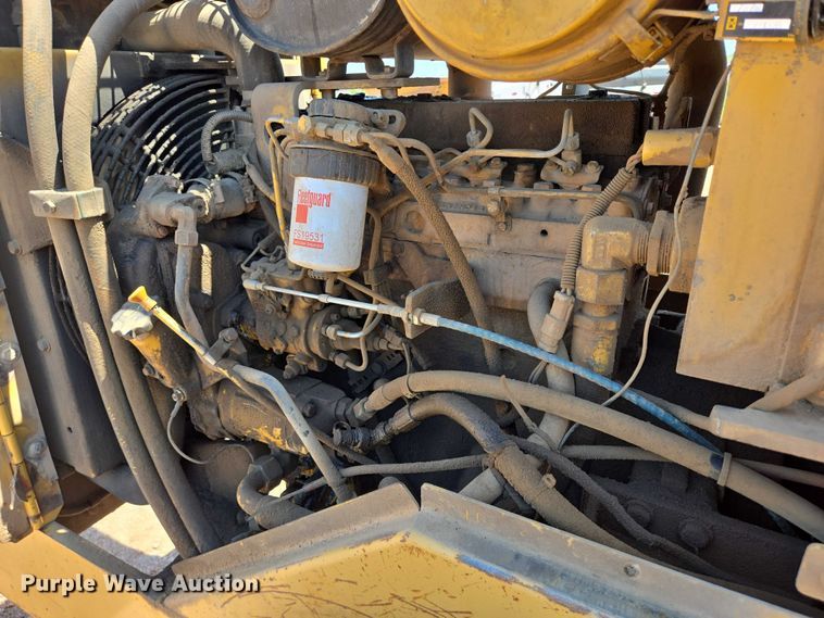 image for item DT7230 1997 Caterpillar CP-433C single drum vibratory roller