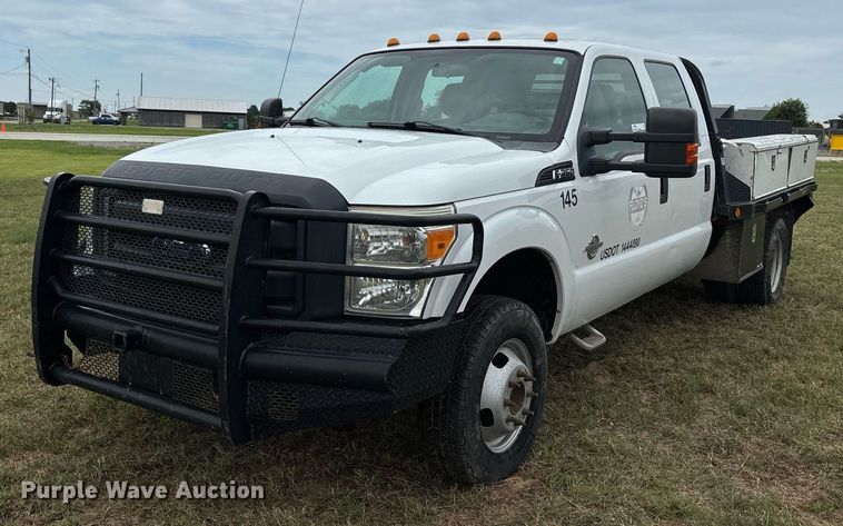 image for item DW7130 2012 Ford F350 Super Duty XL Crew Cab flatbed pickup truck