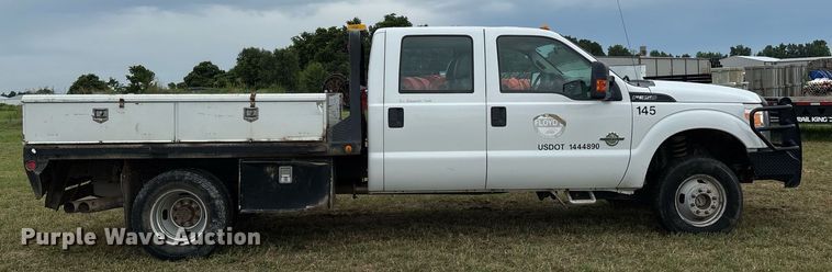image for item DW7130 2012 Ford F350 Super Duty XL Crew Cab flatbed pickup truck