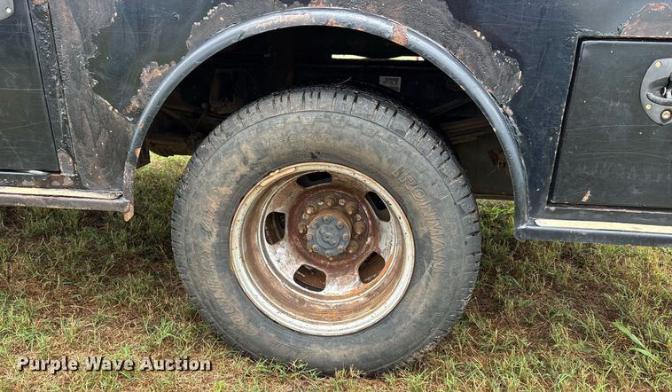 image for item DW7131 2016 Dodge Ram 3500 Crew Cab utility bed pickup truck