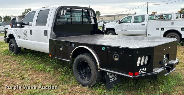 image for item DW7132 2012 Ford F350 Super Duty XL  Crew Cab flatbed pickup truck