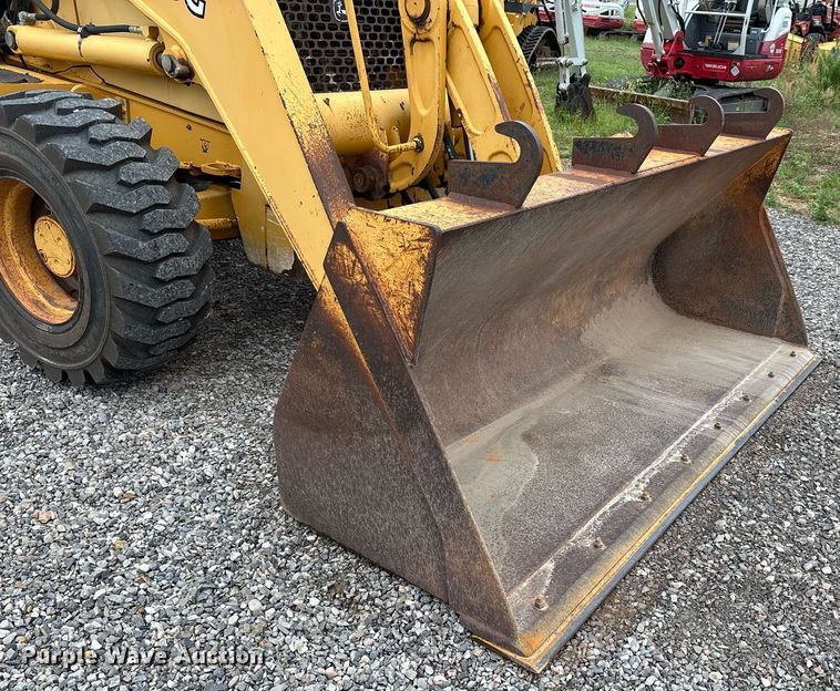 image for item DW7151 2005 John Deere 710G backhoe