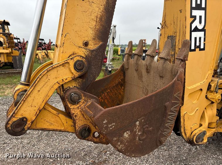 image for item DW7151 2005 John Deere 710G backhoe