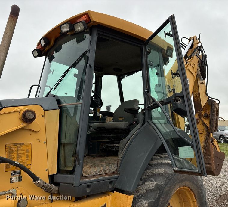 image for item DW7151 2005 John Deere 710G backhoe
