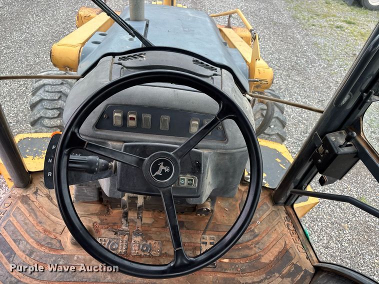 image for item DW7151 2005 John Deere 710G backhoe