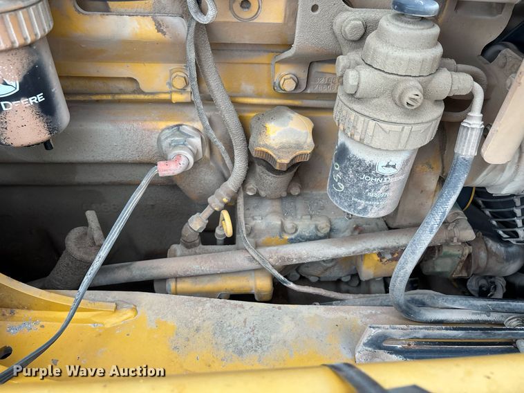 image for item DW7151 2005 John Deere 710G backhoe