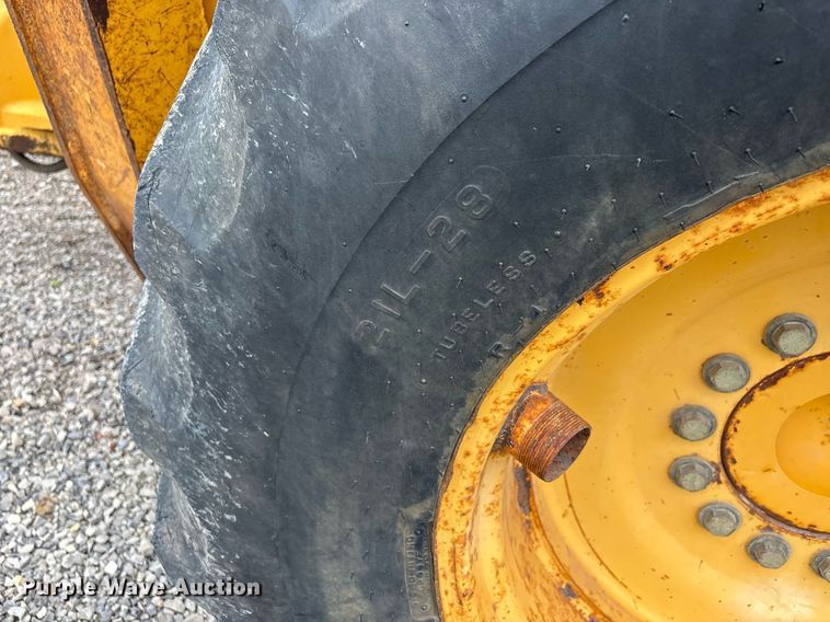 image for item DW7151 2005 John Deere 710G backhoe