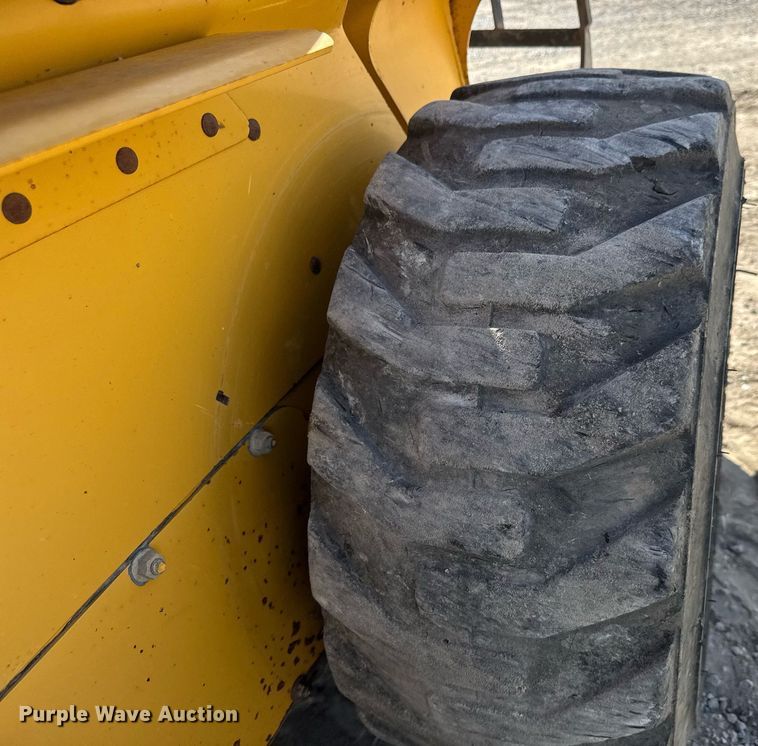 image for item DY0244 2003 John Deere 250 skid steer loader