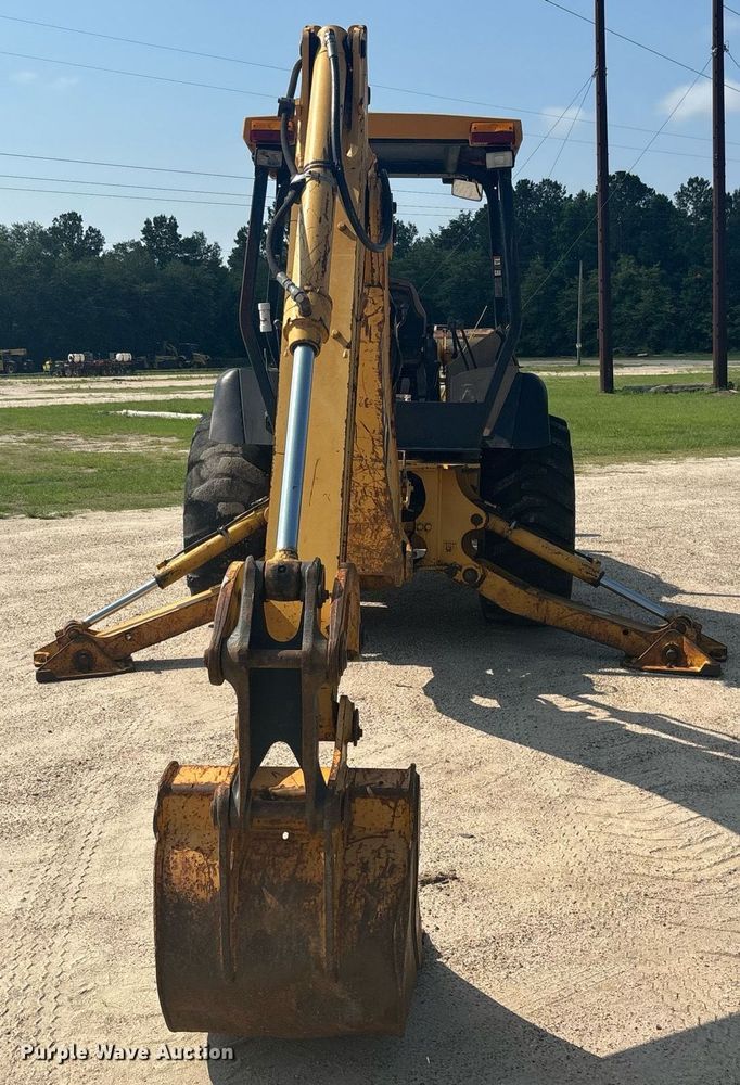 image for item EC3732 2000 John Deere 310E backhoe