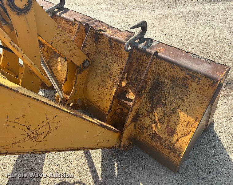 image for item EC3732 2000 John Deere 310E backhoe