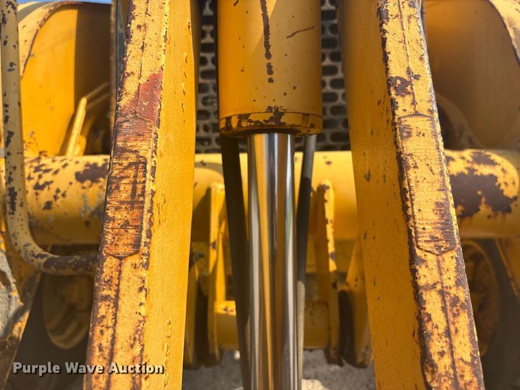 image for item EC3732 2000 John Deere 310E backhoe