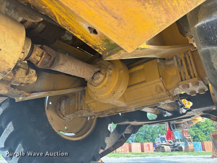 image for item EC3732 2000 John Deere 310E backhoe