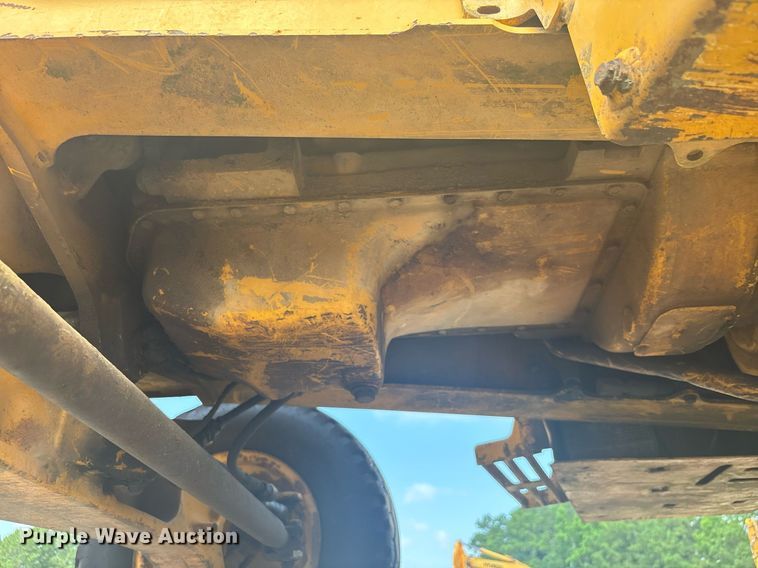 image for item EC3732 2000 John Deere 310E backhoe