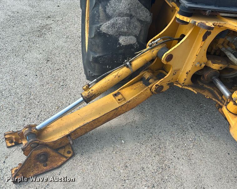 image for item EC3732 2000 John Deere 310E backhoe