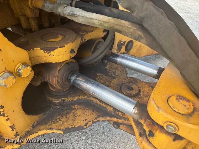 image for item EC3732 2000 John Deere 310E backhoe