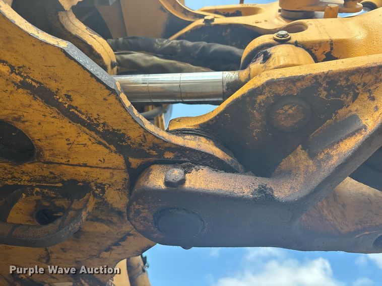 image for item EC3732 2000 John Deere 310E backhoe