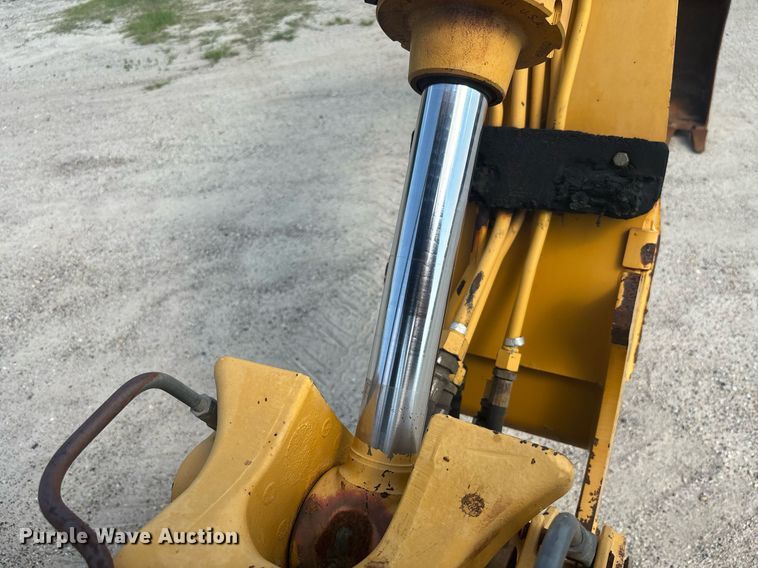 image for item EC3732 2000 John Deere 310E backhoe