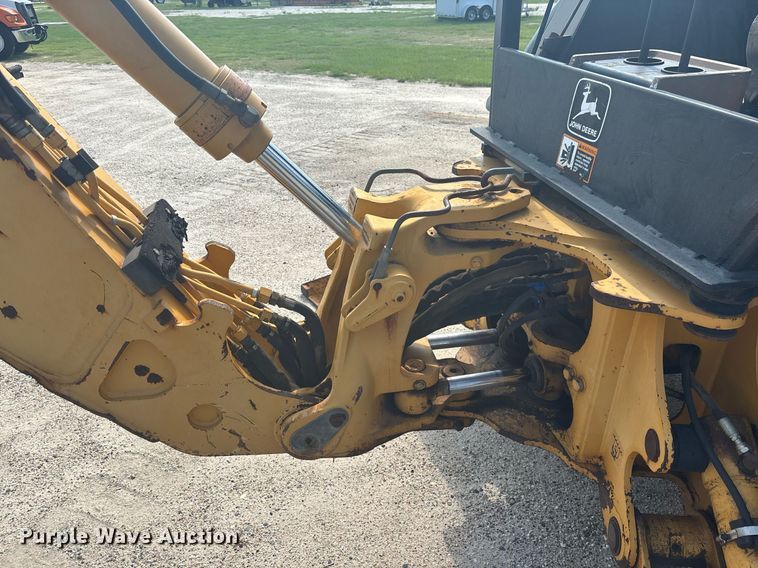 image for item EC3732 2000 John Deere 310E backhoe