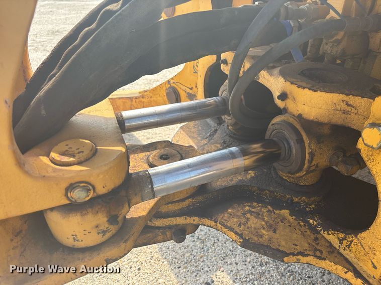 image for item EC3732 2000 John Deere 310E backhoe