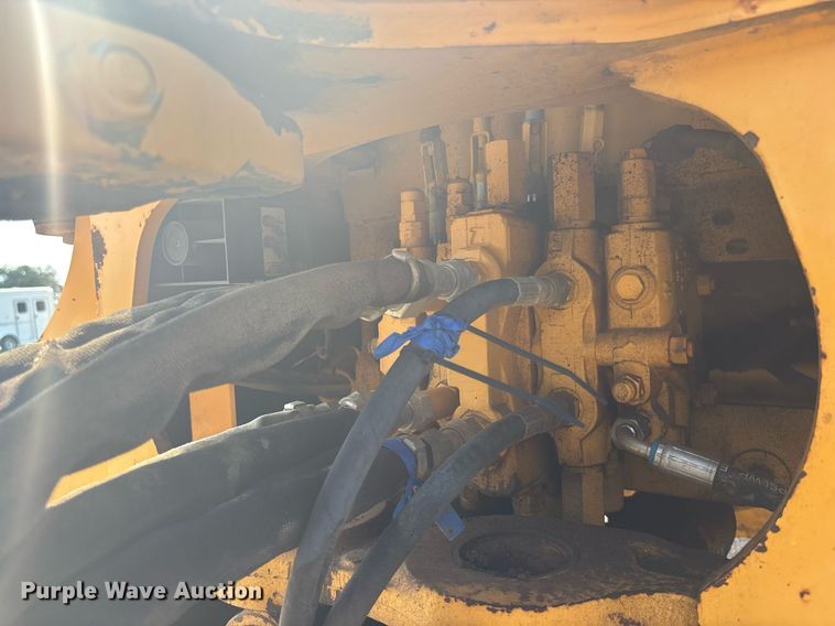 image for item EC3732 2000 John Deere 310E backhoe