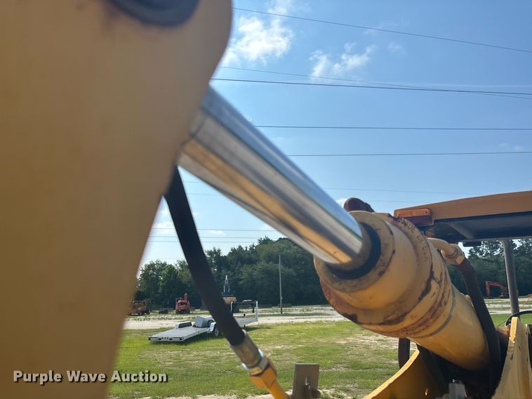 image for item EC3732 2000 John Deere 310E backhoe