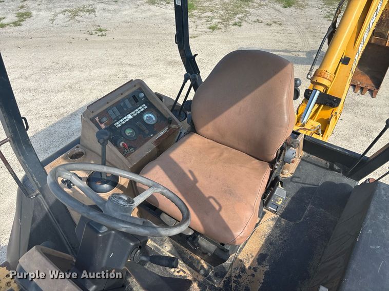 image for item EC3732 2000 John Deere 310E backhoe