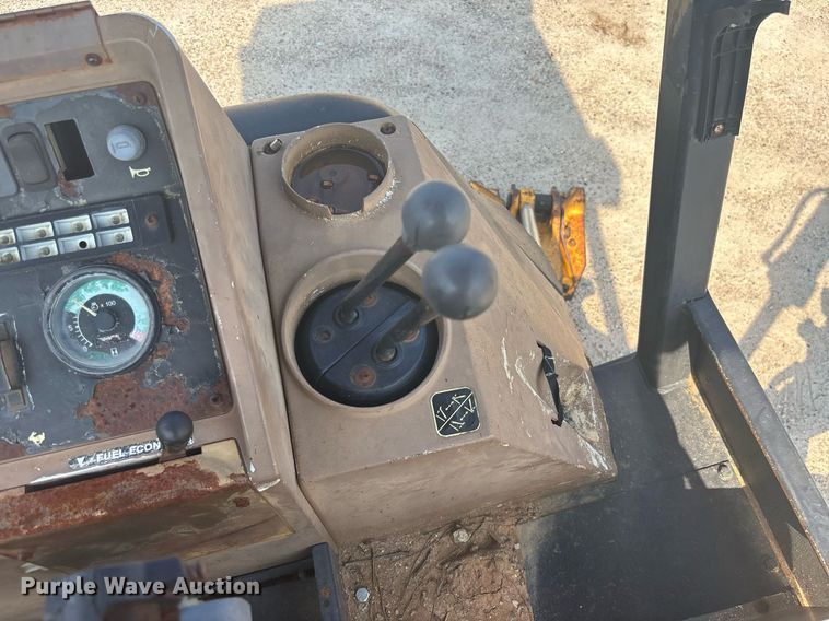 image for item EC3732 2000 John Deere 310E backhoe