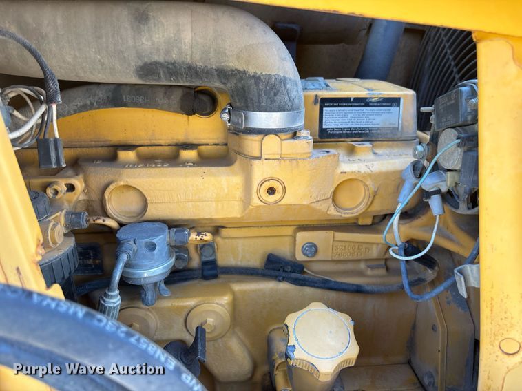 image for item EC3732 2000 John Deere 310E backhoe